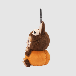 Side view of the Halloween pumpkin plush pendant with vinyl face